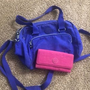 Purple Kipling purse and pink wallet